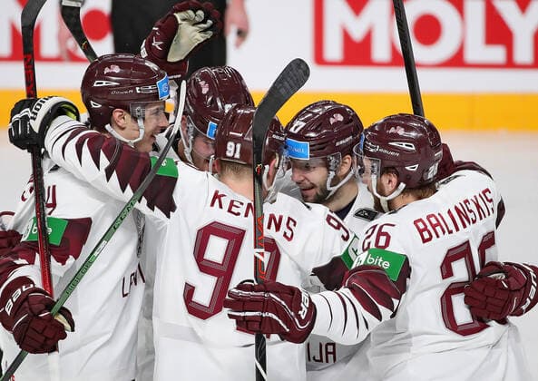 Eishockey, WM, Kanada - Lettland RIGA, LATVIA - MAY 21, 2021: Latviaâ€™s players celebrate a goal in their 2021 IIHF World Championship, WM, Weltmeisterschaft Group A Ice hockey, Eishockey match at Arena Riga. Natalia Fedosenko TASS  TS100E40