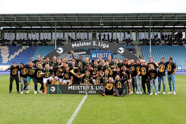 Wiesbaden, Germany 22 May 2021 3 Liga 2020 2021 Wehen Wiesbaden vs Dynamo Dresden Dresden players and support staff celebrate the 3 Liga championship DFB regulations prohibit any use of photographs as image sequences and or quasi video Britta Arena Hessen Copyright: xFotostandx xRacochax