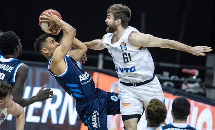 Basketball Bundesliga, Alba Berlin Hamburg Towers, Playoff Quarterfinal, 2 Matchday, Mercedes Benz Arena ALBAs Maodo Lo l fights for the ball against Patrick Spencer of Hamburg Towers ALBA Berlin Hamburg Towers