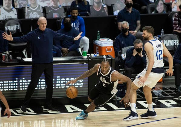 May 22, 2021, Los Angeles, California, USA: Head coach, Rick Carlisle of the Dallas Mavericks on the sideline as Kawhi Leonard 2 of the Los Angeles Clippers drives past Maxi Kleber 42 of the Dallas Mavericks during Game One of the Western Conference First Round game on Saturday May 22, 2021 at the Staples Center in Los Angeles, California. Clippers lose to Mavericks, 103-113. PI Los Angeles USA - ZUMAp124 20210522_zaa_p124_025 Copyright: xJAVIERxROJASx