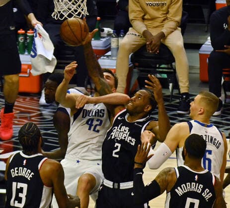 Los Angeles Clippers forward Kawhi Leonard (2) fouls Dallas Maverick s forward Maxi Kleber (42) during the second half of their best-of-seven playoff series opener at Staples Center in Los Angeles on Saturday, May 22, 2021. The Mavericks defeated the Clippers 113-103.  LAP2021052229 JIMxRUYMEN