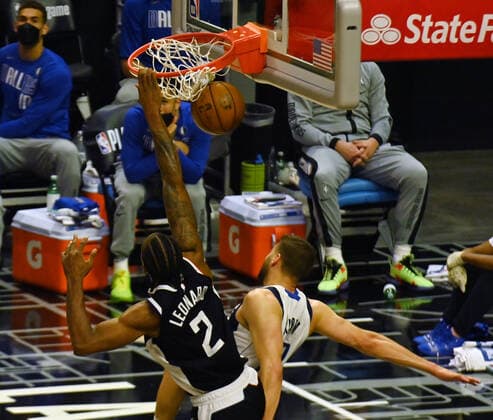 Los Angeles Clippers forward Kawhi Leonard (2) jams over Dallas Maverick s forward Maxi Kleber (42) during the second half of their best-of-seven playoff series opener at Staples Center in Los Angeles on Saturday, May 22, 2021. The Mavericks defeated the Clippers 113-103.  LAP2021052230 JIMxRUYMEN