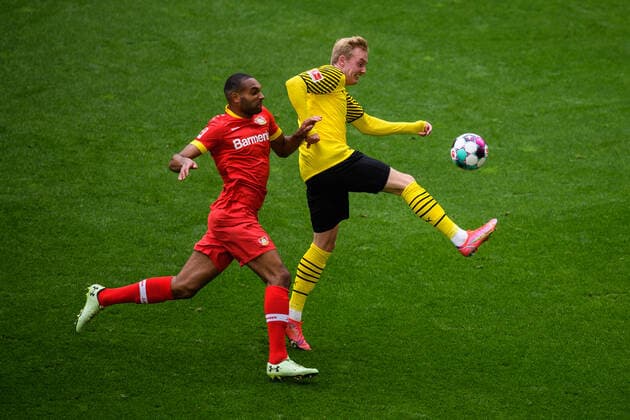 GES Football Borussia Dortmund Bayer 04 Leverkusen, 22 05 2021 Duel, duel between Jonathan Tah Leverkusen and Julian Brandt BVB GES Football 1 Bundesliga Borussia Dortmund Bayer 04 Leverkusen, 22 05 2021 Football Soccer 1st german league Dortmund vs Leverkusen, Dortmund, May 22, 2021 Photo GES Edith Geuppert Pool via Norbert Schmidt DFL regulations prohibit any use of photographs as image sequences and or quasi video Dortmund NW Germany Poolfoto GES Edith Geuppert pool ,EDITORIAL USE ONLY