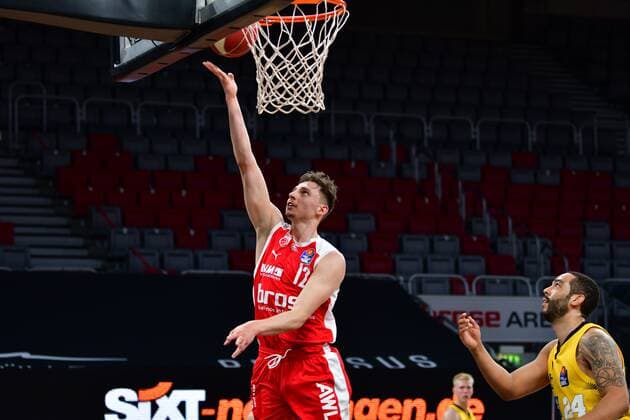 BAMBERG 23 05 2021 Basketball easycredit 1 Basketball Bundesliga 3 playoff quarterfinal match Brose Bamberg vs MHP Riesen Ludwigsburg Moritz Pleschner 12, Brose Bamberg with a basket against Andrew Warren 24, MHP Riesen Ludwigsburg Photo Hans Martin Issler isslerimages Brose Bamberg vs MHP Riesen Ludwigsburg