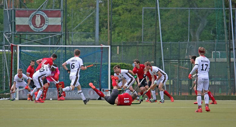 Test match of the German hockey men against Canada Canadas Gordon Johnston hits the ball while falling towards the DHB goal