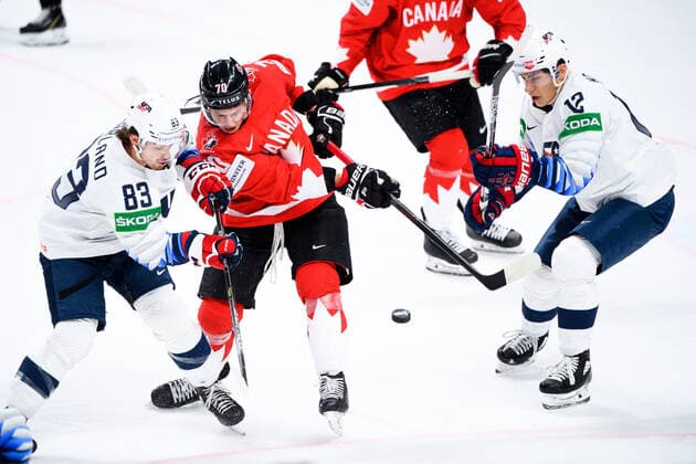 210523 Troy Stecher of Canada against Conor Garland and Trevor Moore of USA during the 2021 IIHF Ice Hockey World Championship game between Canada and USA on May 23, 2021 in Riga Photo Simon Hastegard BILDBYRAN kod SH SH0112 ishockey ice hockey ishockey vm iihf ice hockey world championship canada kanada usa day 3 bbeng,  Copyright: SIMONxHASTEGARD BB210523SH215