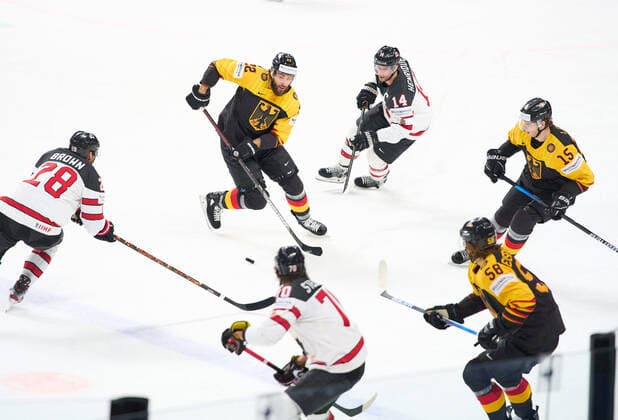 Matthias PLACHTA 22 of Germany Stefan LOIBL 15 of Germany Markus EISENSCHMID 58 of Germany compete, fight for the puck against Connor Brown 28 of Canada Adam Henrique 14 of Canada GERMANY - CANADA IIHF Ice hockey, Eishockey WORLD CHAMPIONSHIPS Group B in Riga, Latvia, Lettland, May 24, 2021, Season 2020 2021