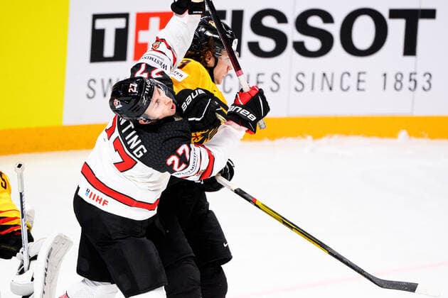 210524 Moritz Seider of Germany against Michael Bunting of Canada during the 2021 IIHF Ice Hockey World Championship game between Germany and Canada on May 24, 2021 in Riga Photo Simon Hastegard BILDBYRAN kod SH SH0113 ishockey ice hockey ishockey vm iihf ice hockey world championship germany tyskland canada kanada day 4 bbeng,  Copyright: SIMONxHASTEGARD BB210524SH046