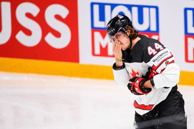 210524 Maxime Comtois of Canada in pain during the 2021 IIHF Ice Hockey World Championship game between Germany and Canada on May 24, 2021 in Riga Photo Simon Hastegard BILDBYRAN kod SH SH0113 ishockey ice hockey ishockey vm iihf ice hockey world championship germany tyskland canada kanada day 4 bbeng,  Copyright: SIMONxHASTEGARD BB210524SH055