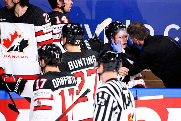 210524 Cole Perfetti of Canada in pain during the 2021 IIHF Ice Hockey World Championship game between Germany and Canada on May 24, 2021 in Riga Photo Simon Hastegard BILDBYRAN kod SH SH0113 ishockey ice hockey ishockey vm iihf ice hockey world championship germany tyskland canada kanada day 4 bbeng depp skada,  Copyright: SIMONxHASTEGARD BB210524SH059