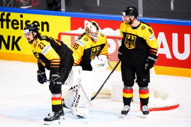 210524 Nicolas Krammer, goalkeeper Mathias Niederberger and Tobias Rieder look dejected during the 2021 IIHF Ice Hockey World Championship game between Germany and Canada on May 24, 2021 in Riga Photo Simon Hastegard BILDBYRAN kod SH SH0113 ishockey ice hockey ishockey vm iihf ice hockey world championship germany tyskland canada kanada day 4 bbeng depp,  Copyright: SIMONxHASTEGARD BB210524SH061