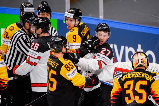 210524 Marcel Brandt of Germany and Michael Bunting of Canada during the 2021 IIHF Ice Hockey World Championship game between Germany and Canada on May 24, 2021 in Riga Photo Simon Hastegard BILDBYRAN kod SH SH0113 ishockey ice hockey ishockey vm iihf ice hockey world championship germany tyskland canada kanada day 4 bbeng,  Copyright: SIMONxHASTEGARD BB210524SH067