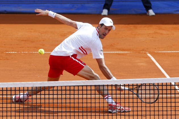 (210526) -- BELGRADE, May 26, 2021 -- Serbia s Novak Djokovic returns to Germany s Mats Moraing during their ATP, Tennis Herren 250 Belgrade Open round of 16 singles tennis match in Belgrade, Serbia on May 25, 2021. (Photo by Predrag Milosavljevic Xinhua) (SP)SERBIA-BELGRADE-TENNIS-NOVAK DJOKOVIC ShixZhongyu 
