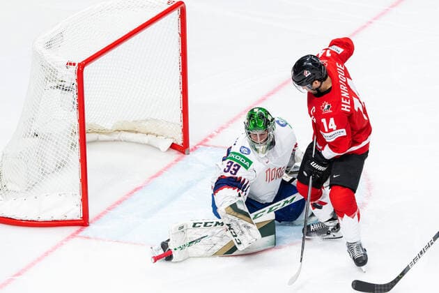 210526 Goalkeeper Henrik Haukeland of Norway and Adam Henrique of Canada during the 2021 IIHF Ice Hockey World Championship game between Canada and Norway on May 26, 2021 in Riga Photo Simon Hastegard BILDBYRAN kod SH SH0117 ishockey ice hockey ishockey vm iihf ice hockey world championship canada kanada norge norway day 6 bbeng,  Copyright: SIMONxHASTEGARD BB210526SH011