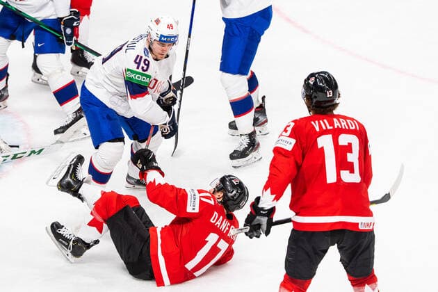 210526 Christian Kasastul of Norway tackles Justin Danforth of Canada during the 2021 IIHF Ice Hockey World Championship game between Canada and Norway on May 26, 2021 in Riga Photo Simon Hastegard BILDBYRAN kod SH SH0117 ishockey ice hockey ishockey vm iihf ice hockey world championship canada kanada norge norway day 6 bbeng,  Copyright: SIMONxHASTEGARD BB210526SH016