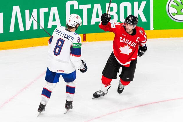 210526 Mathias Trettenes of Norway looks dejected while Adam Henrique of Canada celebrates after scoring 4 2 during the 2021 IIHF Ice Hockey World Championship game between Canada and Norway on May 26, 2021 in Riga Photo Simon Hastegard BILDBYRAN kod SH SH0117 ishockey ice hockey ishockey vm iihf ice hockey world championship canada kanada norge norway day 6 bbeng jubel depp,  Copyright: SIMONxHASTEGARD BB210526SH047