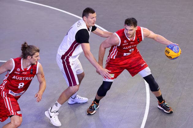 BASKETBALL - FIBA 3x3 Olympic Qualifying GRAZ,AUSTRIA,27.MAY.21 - BASKETBALL - FIBA 3x3 Olympic Qualifying, men, AUT vs LAT. Image shows Moritz Lanegger (AUT), Agnis Cavars (LAT) and Filip Kraemer (AUT).  GEPAxpictures xChristianxWalgram