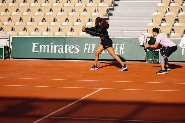 Mandatory Credit: Photo by Javier Garcia BPI Shutterstock (11976928m) Naomi Osaka practices with fitness coach Yutaka Nakamura French Open Tennis, Friday Previews, Roland Garros, Paris, France - 28 May 2021 French Open Tennis, Friday Previews, Roland Garros, Paris, France - 28 May 2021  Copyright: xJavierxGarcia BPI Shutterstockx 11976928m