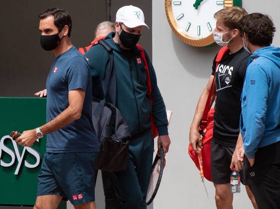 Swiss Roger Federer and Belgian David Goffin pictured prior a training session at the Roland Garros French Open tennis event, in Paris, France, Friday 28 May 2021. This year s tournament takes place from 24 May to 13 June. BENOITxDOPPAGNE  x2723927x