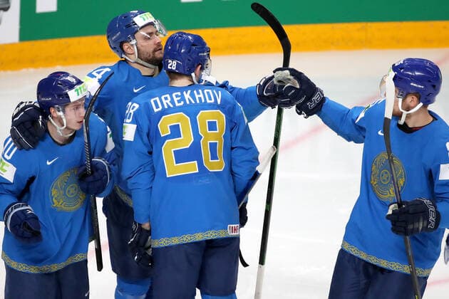 RIGA, LATVIA â€“ MAY 28, 2021: Kazakhstan s Nikita Mikhailis, Kirill Savitsky, Valery Orekhov, and Alexei Maklyukov (L-R) celebrate scoring in their 2021 IIHF Ice hockey, Eishockey World Championship, WM, Weltmeisterschaft Preliminary Round Group B match against Canada, at the Arena Riga. Natalia Fedosenko TASS  TS101E1D