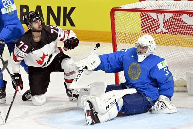 Brandon Pirri (L) of Canada vies with goalkeeper Andrei Shutov of Kazakhstan during the 2021 IIHF Men s Ice hockey, Eishockey World Championships preliminary round group B match between Kazakhstan and Canada in Riga, Latvia, on May 28, 2021. Riika, Riga Latvia LKFTJK20210528171112LXZZ  Copyright: xJussixNukarix