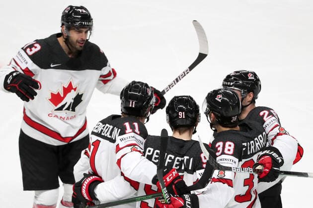 RIGA, LATVIA – MAY 28, 2021: Canada s Brandon Pirri, Jaret Anderson-Dolan, Cole Perfetti, Mario Ferraro, and Sean Walker (L-R) celebrate scoring in their 2021 IIHF Ice hockey, Eishockey World Championship, WM, Weltmeisterschaft Preliminary Round Group B match against Kazakhstan, at the Arena Riga. Natalia Fedosenko TASS TS101EF8