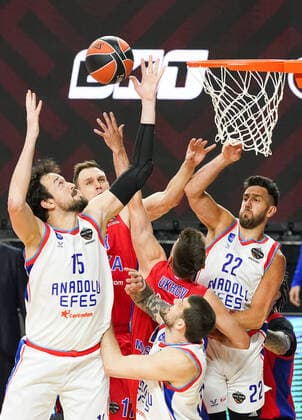 COLOGNE, GERMANY â€“ MAY 28, 2021: Anadolu Efes Istanbulâ€™s Sanli Sertac (L front), Adrien Moerman (C front), Vasilije Micic (R) and CSKA Moscowâ€™s Ivan Ukhov (C midground) and Johannes Voigtmann (L back) in the 2020-21 Euroleague Final Four Semifinal B basketball match between CSKA Moscow and Anadolu Efes Istanbul at Lanxess Arena. Tatyana Makeyeva TASS  TS101F3B