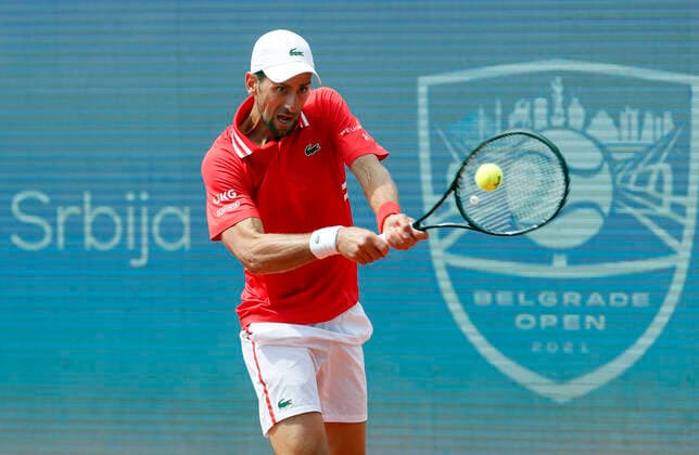 (210530) -- BELGRADE, May 30, 2021 -- Serbia s Novak Djokovic hits a return during the ATP, Tennis Herren 250 Belgrade Open singles final between Serbia s Novak Djokovic and Slovakia s Alex Molcan in Belgrade, Serbia on May 29, 2021. (Photo by Xinhua) (SP)SERBIA-BELGRADE-TENNIS-ATP BELGRADE OPEN-FINAL PredragxMilosavljevic 