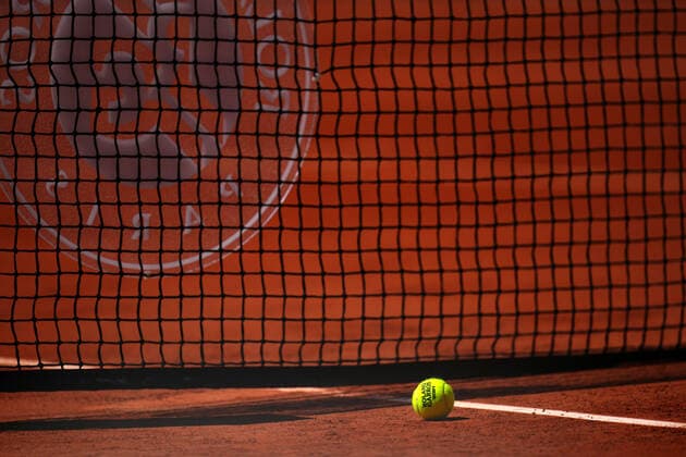 Mandatory Credit: Photo by Javier Garcia BPI Shutterstock (11977037do) Tennis ball on court French Open Tennis, Day One, Roland Garros, Paris, France - 30 May 2021 French Open Tennis, Day One, Roland Garros, Paris, France - 30 May 2021  Copyright: xJavierxGarcia BPI Shutterstockx 11977037do