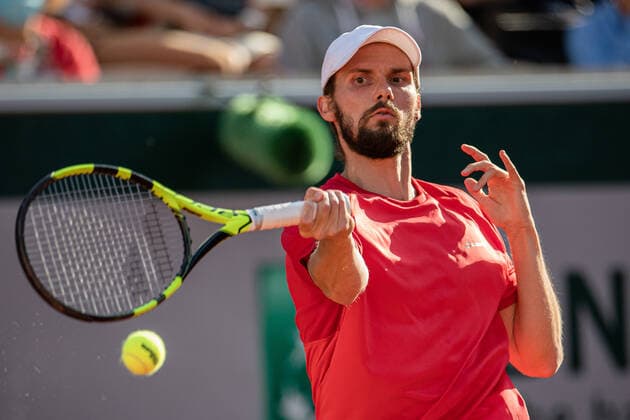 (210531) -- PARIS, May 31, 2021 -- Oscar Otte of Germany hits a return during the men s singles first round match against Alexander Zverev of Germany at the French Open tennis tournament at Roland Garros in Paris, France, May 30, 2021. (Photo by Xinhua) (SP)FRANCE-PARIS-TENNIS-ROLAND GARROS-FRENCH OPEN-MEN S SINGLES AurelienxMorissard 