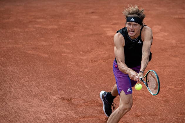 (210531) -- PARIS, May 31, 2021 -- Alexander Zverev of Germany hits a return during the men s singles first round match against Oscar Otte of Germany at the French Open tennis tournament at Roland Garros in Paris, France, May 30, 2021. (Photo by Xinhua) (SP)FRANCE-PARIS-TENNIS-ROLAND GARROS-FRENCH OPEN-MEN S SINGLES AurelienxMorissard 