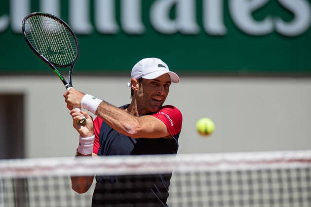 (210531) -- PARIS, May 31, 2021 -- Pablo Andujar of Spain hits a return during the men s singles first round match against Dominic Thiem of Austria at the French Open tennis tournament at Roland Garros in Paris, France, May 30, 2021. (Photo by Xinhua) (SP)FRANCE-PARIS-TENNIS-ROLAND GARROS-FRENCH OPEN-MEN S SINGLES AurelienxMorissard 