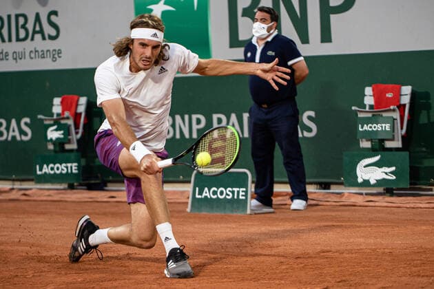 (210531) -- PARIS, May 31, 2021 -- Stefanos Tsitsipas of Greece hits a return during the men s singles first round match against Jeremy Chardy of France at the French Open tennis tournament at Roland Garros in Paris, France, May 30, 2021. (Photo by Xinhua) (SP)FRANCE-PARIS-TENNIS-ROLAND GARROS-FRENCH OPEN-MEN S SINGLES AurelienxMorissard 