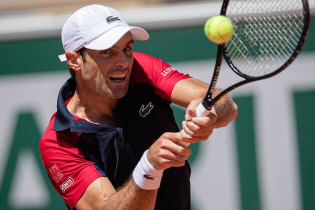 (210531) -- PARIS, May 31, 2021 -- Pablo Andujar of Spain hits a return during the men s singles first round match against Dominic Thiem of Austria at the French Open tennis tournament at Roland Garros in Paris, France, May 30, 2021. (Photo by Xinhua) (SP)FRANCE-PARIS-TENNIS-ROLAND GARROS-FRENCH OPEN-MEN S SINGLES AurelienxMorissard 