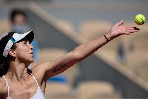 (210531) -- PARIS, May 31, 2021 -- Patricia Maria Tig of Romania returns the ball during the women s singles first round match against Osaka Naomi of Japan at the French Open tennis tournament at Roland Garros in Paris, France, May 30, 2021. (Photo by Aurelien Morissard Xinhua) (SP)FRANCE-PARIS-TENNIS-ROLAND GARROS-FRENCH OPEN-WOMEN S SINGLES AoxLeilian¡¤molisaer 