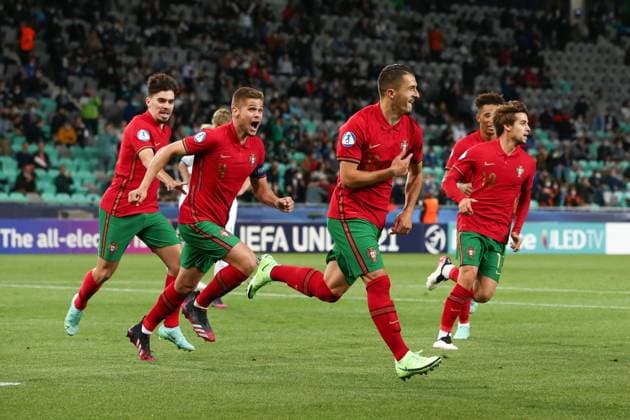 Fußball, U21 EM Viertelfinale, Portugal - Italien Ljubljana, Slovenia, 31st May 2021. Dany Mota of Portugal celebrates with team mates after scoring to give the side a 1-0 lead during the UEFA U21, U 21 Championships 2021 match at Stadion Stoczicw, Ljubljana. Picture credit should read: Jonathan Moscrop Sportimage EDITORIAL USE ONLY. No use with unauthorised audio, video, data, fixture lists, club league logos or live services. Online in-match use limited to 120 images, no video emulation. No use in betting, games or single club league player publications. SPI-1070-0001