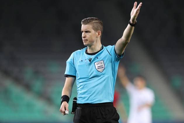 Ljubljana, Slovenia, 31st May 2021. The referee Francois Letexier indicates for a corner kick during the UEFA U21, U 21 Championships 2021 match at Stadion Stoczicw, Ljubljana. Picture credit should read: Jonathan Moscrop Sportimage EDITORIAL USE ONLY. No use with unauthorised audio, video, data, fixture lists, club league logos or live services. Online in-match use limited to 120 images, no video emulation. No use in betting, games or single club league player publications. SPI-1070-0015