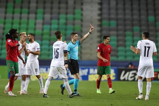 Ljubljana, Slovenia, 31st May 2021. The referee Francoise Letexier shows a red card in the direction of Matteo Lovato of Italy for an alleged foul on Dany Mota of Portugal during the UEFA U21, U 21 Championships 2021 match at Stadion Stoczicw, Ljubljana. Picture credit should read: Jonathan Moscrop Sportimage EDITORIAL USE ONLY. No use with unauthorised audio, video, data, fixture lists, club league logos or live services. Online in-match use limited to 120 images, no video emulation. No use in betting, games or single club league player publications. SPI-1070-0059