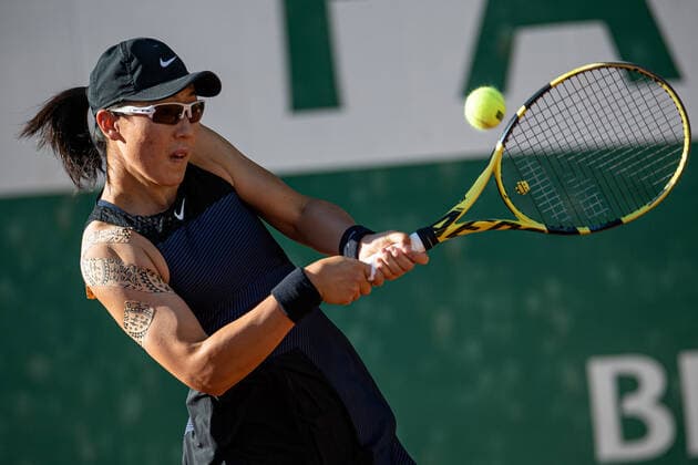(210601) -- PARIS, June 1, 2021 -- Zheng Saisai of China hits a return during the women s singles first round match against Sara Sorribes Tormo of Spain at the French Open tennis tournament at Roland Garros in Paris, France, May 31, 2021. (Photo by Xinhua) (SP)FRANCE-PARIS-TENNIS-ROLAND GARROS-FRENCH OPEN-WOMEN S SINGLES AurelienxMorissard 