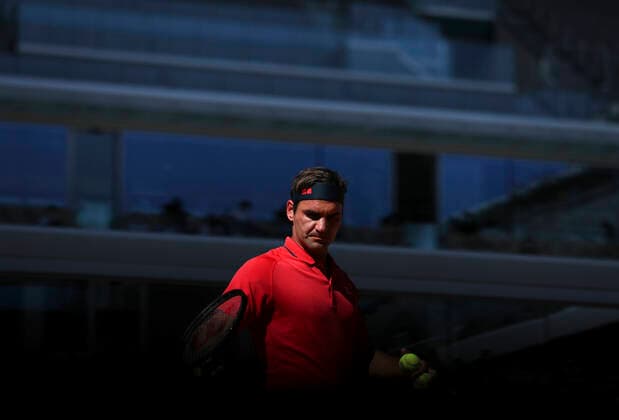 (210601) -- PARIS, June 1, 2021 -- Roger Federer of Switzerland reacts during the men s singles first round match against Denis Istomin of Uzbekistan at the French Open tennis tournament at Roland Garros in Paris, France, May 31, 2021. ) (SP)FRANCE-PARIS-TENNIS-ROLAND GARROS-FRENCH OPEN-MEN S SINGLES GaoxJing 