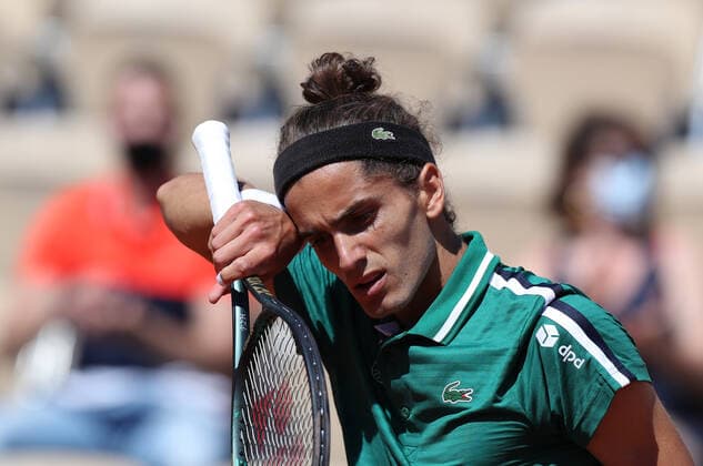 (210601) -- PARIS, June 1, 2021 -- Pierre-Hugues Herbert of France reacts during the men s singles first round match against Jannik Sinner of Italy Open tennis tournament at Roland Garros in Paris, France, May 31, 2021. ) (SP)FRANCE-PARIS-TENNIS-ROLAND GARROS-FRENCH OPEN-MEN S SINGLES GaoxJing 