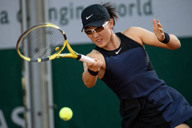 (210601) -- PARIS, June 1, 2021 -- Zheng Saisai of China hits a return during the women s singles first round match against Sara Sorribes Tormo of Spain at the French Open tennis tournament at Roland Garros in Paris, France, May 31, 2021. (Photo by Xinhua) (SP)FRANCE-PARIS-TENNIS-ROLAND GARROS-FRENCH OPEN-WOMEN S SINGLES AurelienxMorissard 
