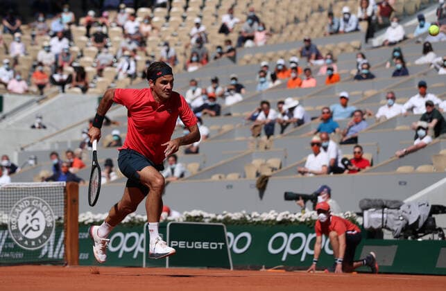 (210601) -- PARIS, June 1, 2021 -- Roger Federer of Switzerland runs for the ball during the men s singles first round match against Denis Istomin of Uzbekistan at the French Open tennis tournament at Roland Garros in Paris, France, May 31, 2021. ) (SP)FRANCE-PARIS-TENNIS-ROLAND GARROS-FRENCH OPEN-MEN S SINGLES GaoxJing 