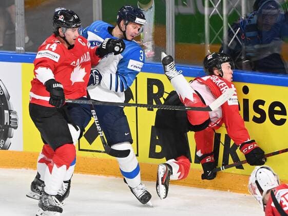 Olli Määttä of Finland (c) vie with Adam Henrique (l) and Jacob Bernard-Docker (r) of Canada during the 2021 IIHF Ice hockey, Eishockey World Championships preliminary round group B match Finland vs. Canada in Riga, Latvia, on June 01, 2021. Riika, Riga Latvia LKFTJK20210601123456LKBN  Copyright: xJussixNukarix