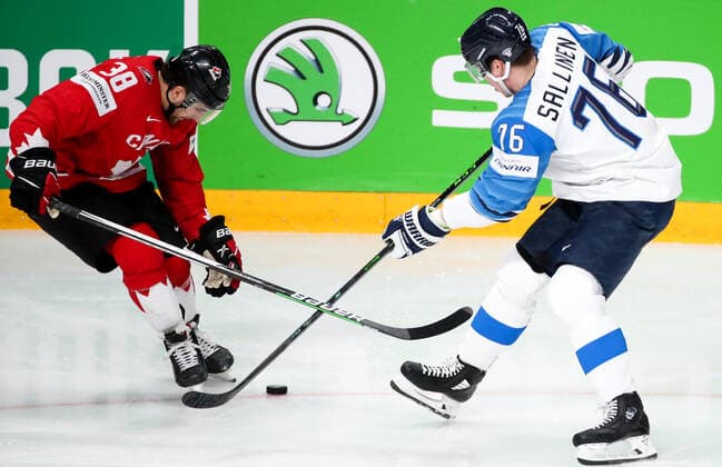 RIGA, LATVIA â€“ JUNE 1, 2021: Canada s Mario Ferraro (L) and Finland s Jere Sallinen in their 2021 IIHF World Championship, WM, Weltmeisterschaft Group B Ice hockey, Eishockey match at Arena Riga. Natalia Fedosenko TASS  TS102568