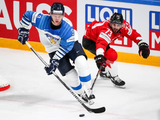 RIGA, LATVIA â€“ JUNE 1, 2021: Finland s Olli Maatta (L) and Canada s Brandon Pirri in their 2021 IIHF World Championship, WM, Weltmeisterschaft Group B Ice hockey, Eishockey match at Arena Riga. Natalia Fedosenko TASS  TS10257D