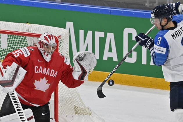 Canadian goalkeeper Darcy Kuemper, left, and Olli Maatta of Finland in action during the 2021 IIHF Ice hockey, Eishockey World Championship, WM, Weltmeisterschaft Group B match Canada vs Finland, played in Riga, Latvia, on June 1, 2021. (CTKxPhoto VitxSimanek) CTKPhotoP2021060103797  vis