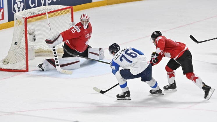 (L-R) Canadian goalkeeper Darcy Kuemper, Jere Sallinen of Finland and Troy Stecher of Canada in action during the 2021 IIHF Ice hockey, Eishockey World Championship, WM, Weltmeisterschaft Group B match Canada vs Finland, played in Riga, Latvia, on June 1, 2021. (CTKxPhoto VitxSimanek) CTKPhotoP2021060104755  vis