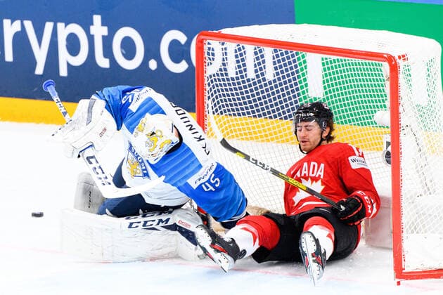 210601 Goalkeeper Jussi Olkinuora of Finland denies a shootout goal from Gabriel Vilardi of Canada during the 2021 IIHF Ice Hockey World Championship game between Canada and Finland on June 1, 2021 in Riga Photo Simon Hastegard BILDBYRAN kod SH SH0128 ishockey ice hockey ishockey vm iihf ice hockey world championship canada kanada finland day 12 bbeng,  Copyright: SIMONxHASTEGARD BB210601SH046