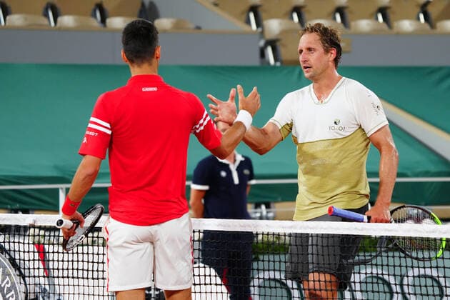 Mandatory Credit: Photo by Javier Garcia BPI Shutterstock (11988207qk) Novak Djokovic is congratulated by Tennys Sandgren after their first round match French Open Tennis, Day Three, Roland Garros, Paris, France - 01 Jun 2021 French Open Tennis, Day Three, Roland Garros, Paris, France - 01 Jun 2021  Copyright: xJavierxGarcia BPI Shutterstockx 11988207qk